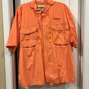 lots of pockets in the front. 40 UPF sun protection. Orange